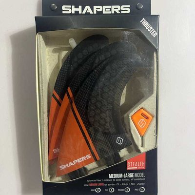 Quillas Shapers negras y naranja
